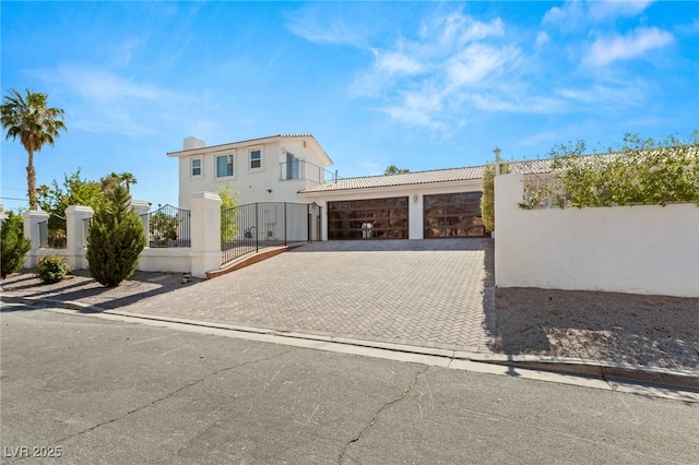 view of front of property with a garage