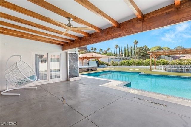 view of swimming pool featuring ceiling fan and a patio