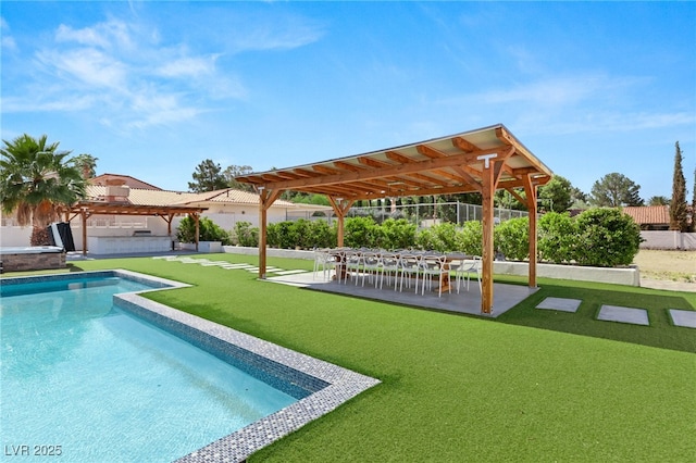 view of swimming pool featuring a pergola, a lawn, and a patio