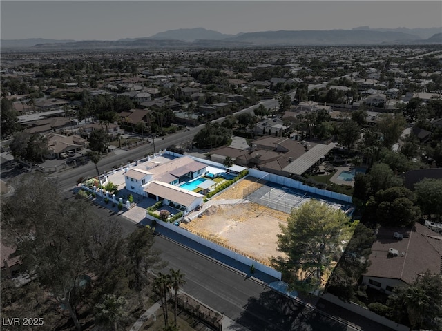 drone / aerial view featuring a mountain view