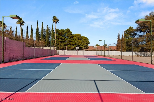 view of sport court featuring basketball court