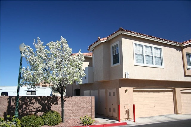 view of front of property featuring a garage