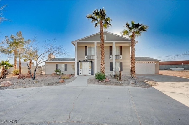 view of front of property featuring a garage