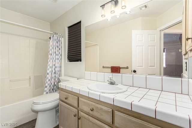 full bathroom with toilet, shower / bath combo, and vanity