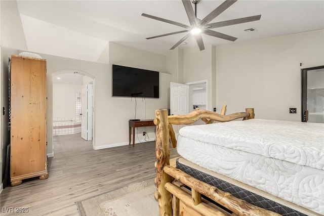 bedroom with ceiling fan and hardwood / wood-style floors