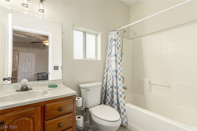 full bathroom featuring toilet, shower / bath combination with curtain, and vanity