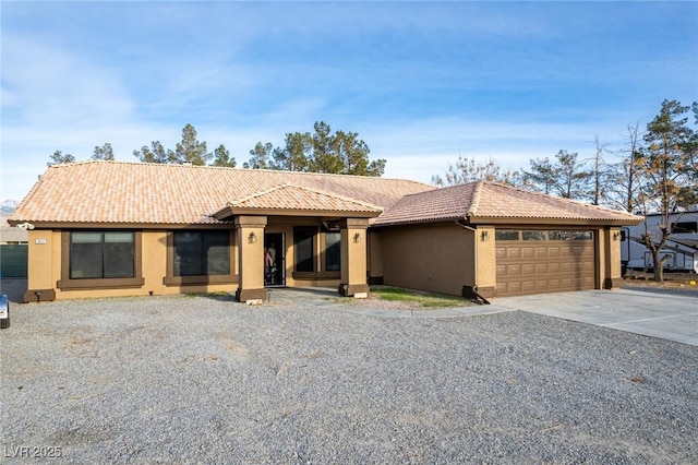 single story home featuring a garage