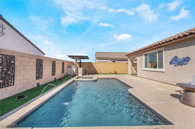 view of pool with pool water feature, an in ground hot tub, and a patio