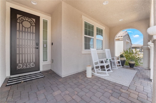 property entrance with a porch