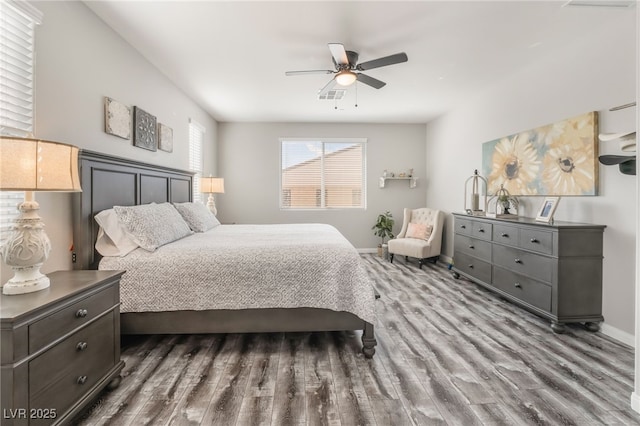 bedroom with ceiling fan and wood-type flooring