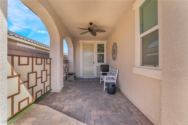 view of patio with ceiling fan