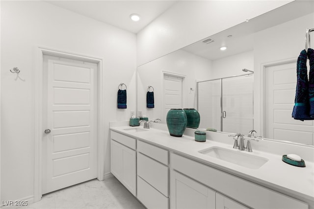 bathroom with vanity and walk in shower