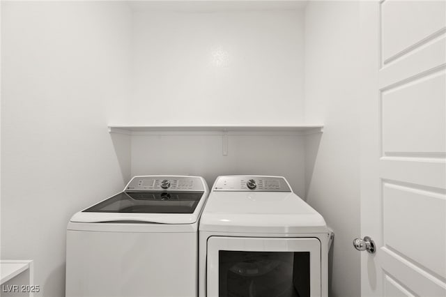 washroom with washer and clothes dryer