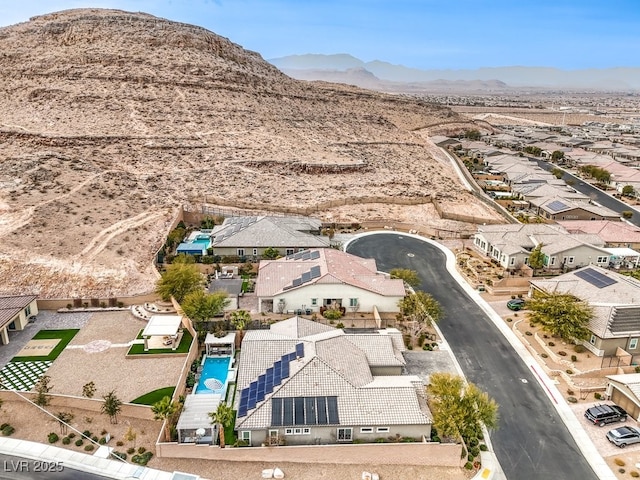 bird's eye view featuring a residential view and a mountain view