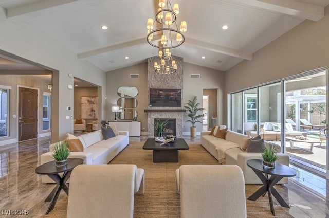 living room with a fireplace, visible vents, a notable chandelier, and beamed ceiling