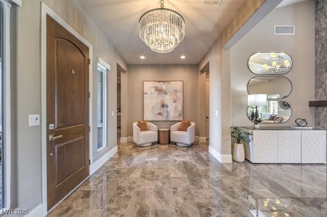 entrance foyer with marble finish floor, a notable chandelier, recessed lighting, visible vents, and baseboards