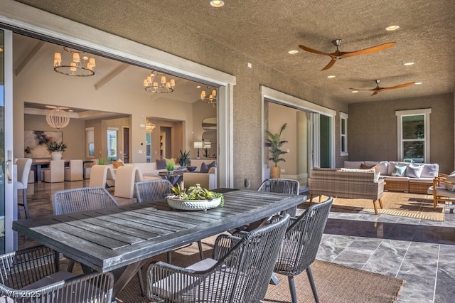 view of patio / terrace featuring outdoor lounge area, ceiling fan, and outdoor dining area