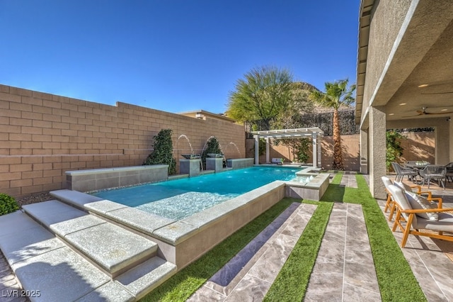 outdoor pool with a patio area, a fenced backyard, and a pergola