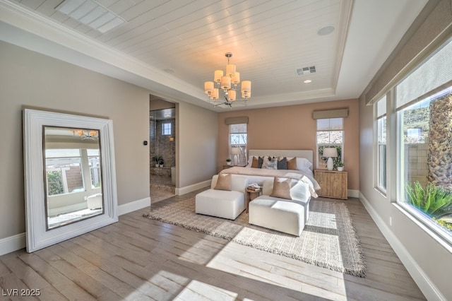 bedroom with a chandelier, light wood-style flooring, visible vents, baseboards, and a raised ceiling