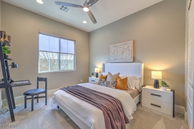 bedroom featuring baseboards, recessed lighting, visible vents, and light colored carpet