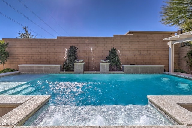 view of pool featuring fence and a fenced in pool