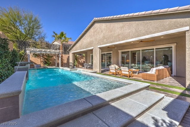 view of pool with ceiling fan, a fenced in pool, and a pergola