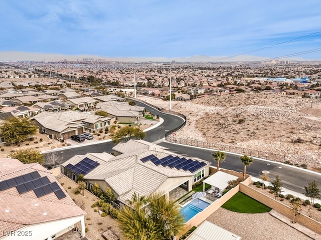 birds eye view of property with a residential view