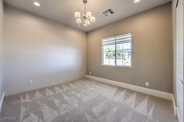 spare room featuring a notable chandelier, recessed lighting, visible vents, carpet flooring, and baseboards