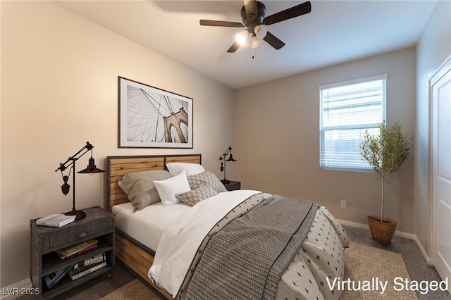 carpeted bedroom with ceiling fan