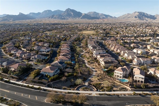 bird's eye view with a mountain view