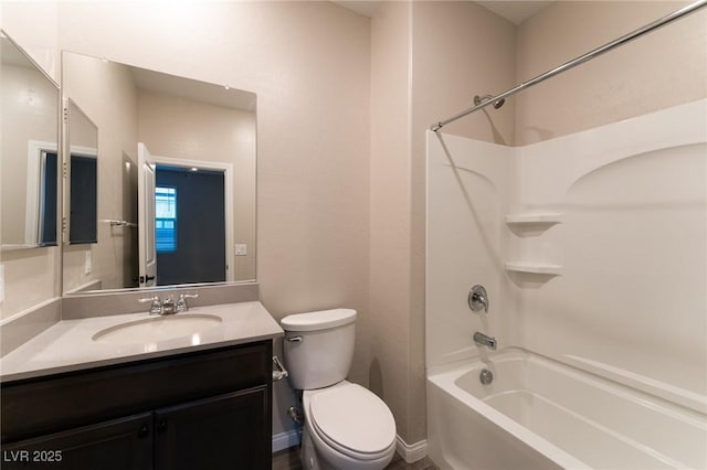 full bathroom with shower / bathing tub combination, vanity, and toilet