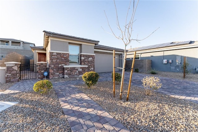 view of front of property featuring a garage