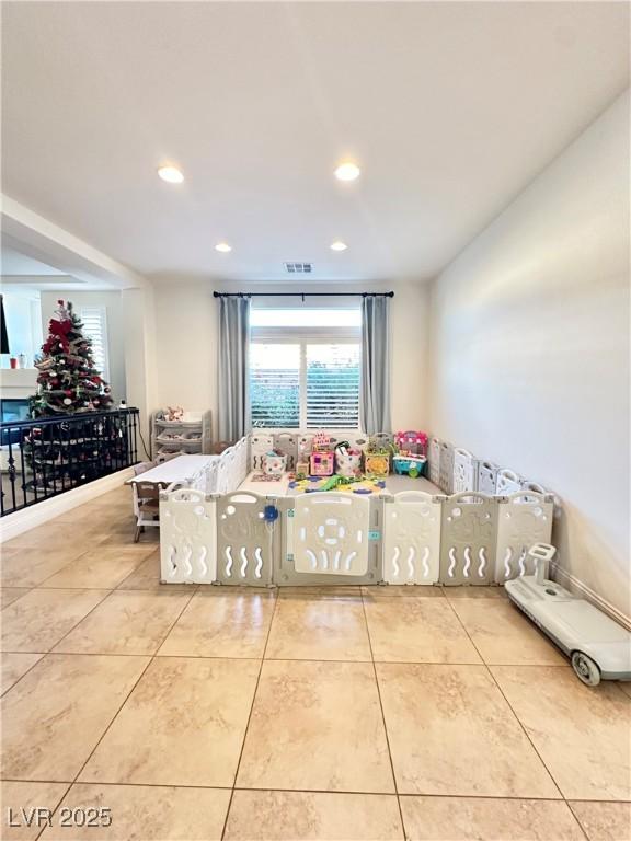 interior space with light tile patterned floors