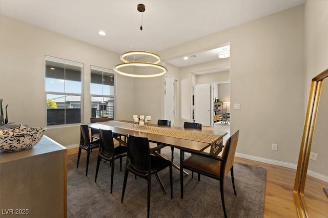 dining space featuring hardwood / wood-style flooring