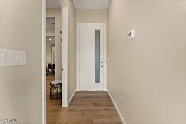 hall featuring hardwood / wood-style floors