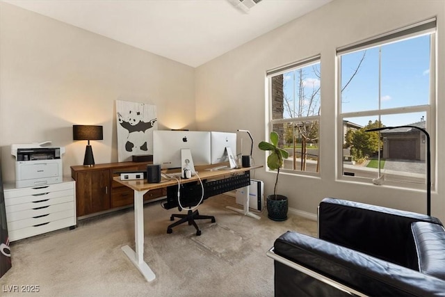 office area featuring light colored carpet