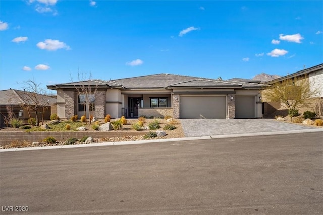 prairie-style house featuring a garage