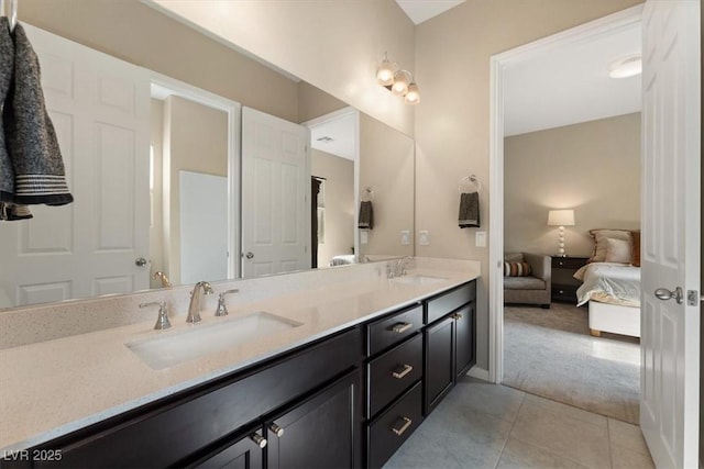 bathroom with tile patterned flooring and vanity