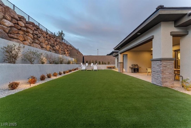 view of yard with a patio