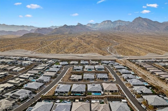 drone / aerial view featuring a mountain view