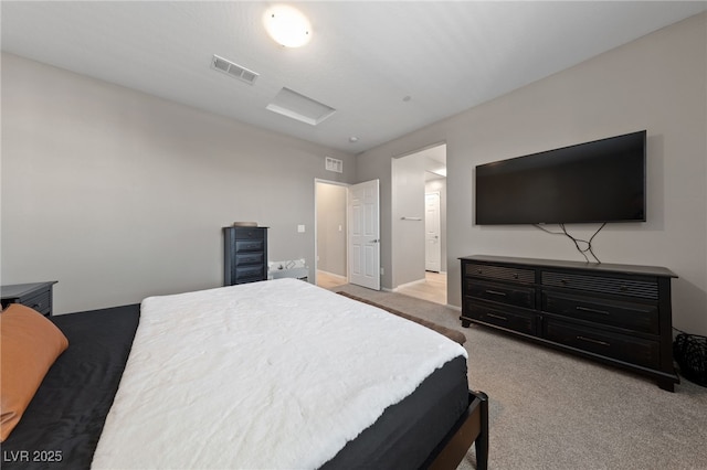 bedroom with light colored carpet