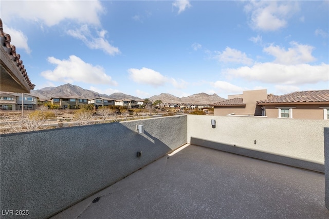 view of patio / terrace featuring a mountain view