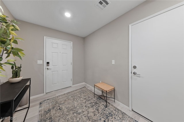 foyer featuring light wood-type flooring