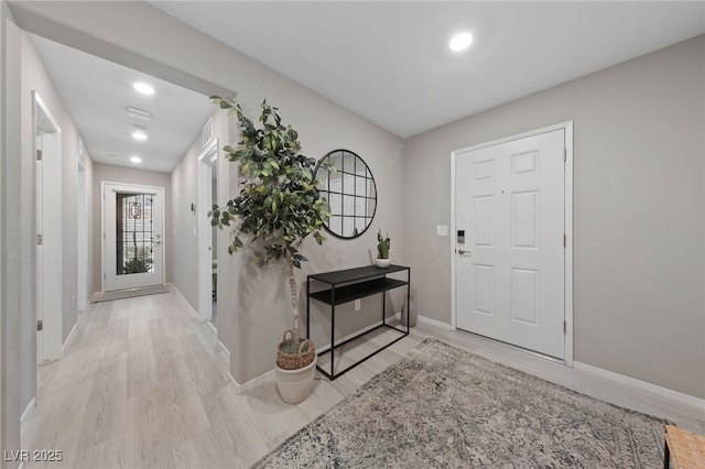 entryway with light wood-type flooring