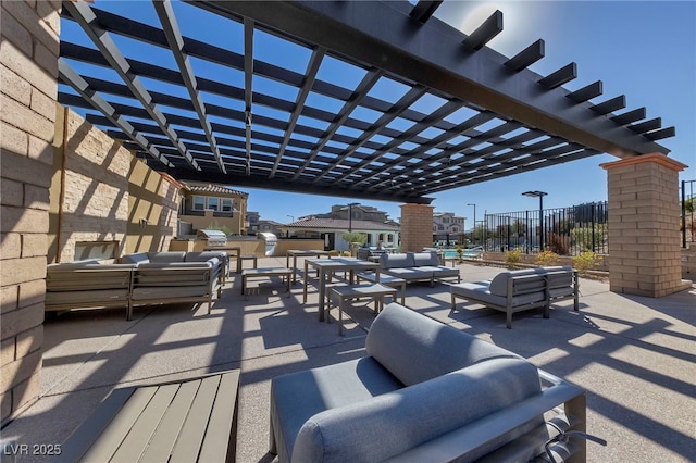 view of patio / terrace featuring outdoor lounge area and a pergola