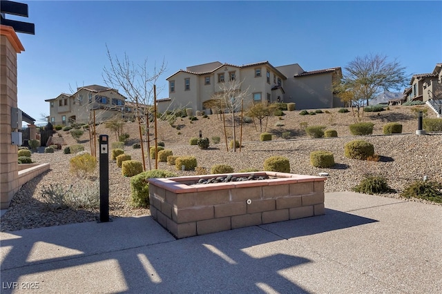 view of patio featuring an outdoor fire pit