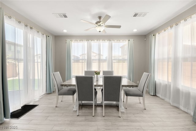 dining area with ceiling fan