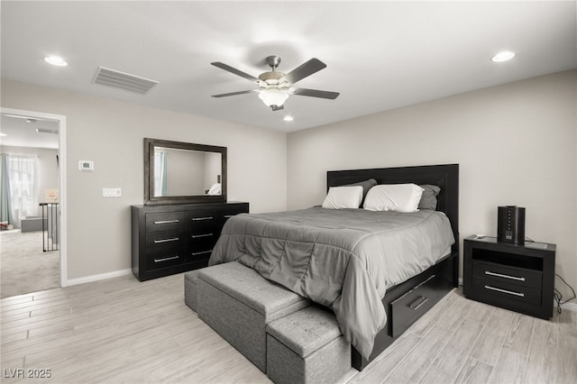 bedroom featuring ceiling fan and light hardwood / wood-style flooring