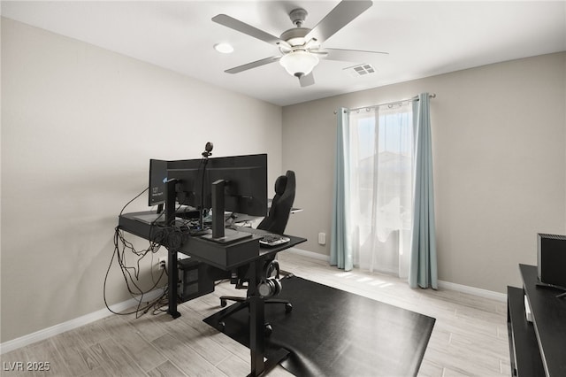 office featuring light hardwood / wood-style flooring and ceiling fan