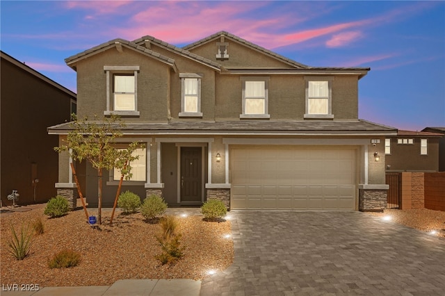 view of front of home featuring a garage